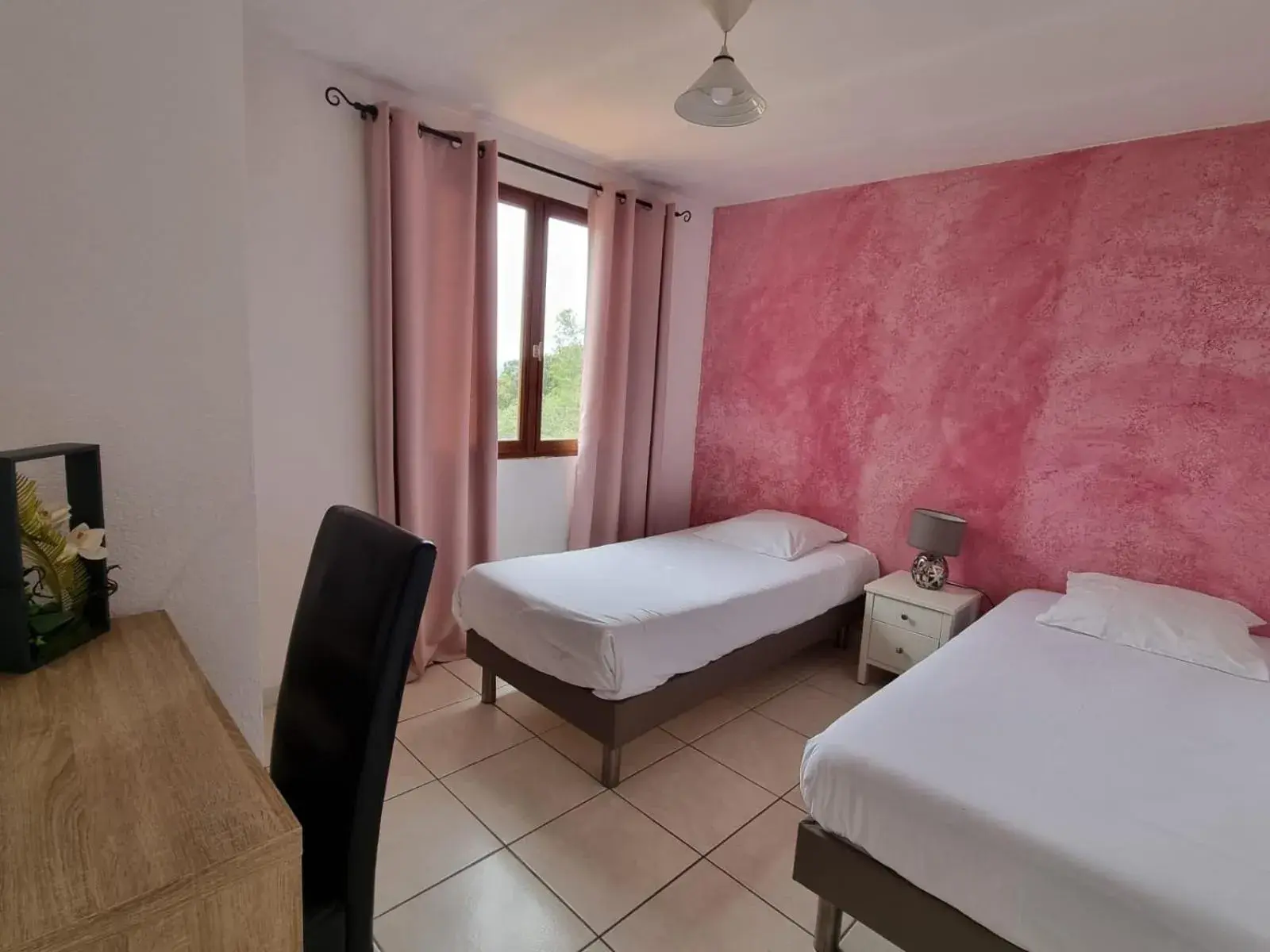Bed in Bungalows Du Maquis